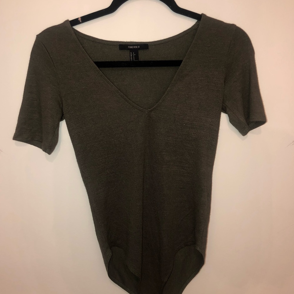 Green bodysuit good for dressing up with a skirt
